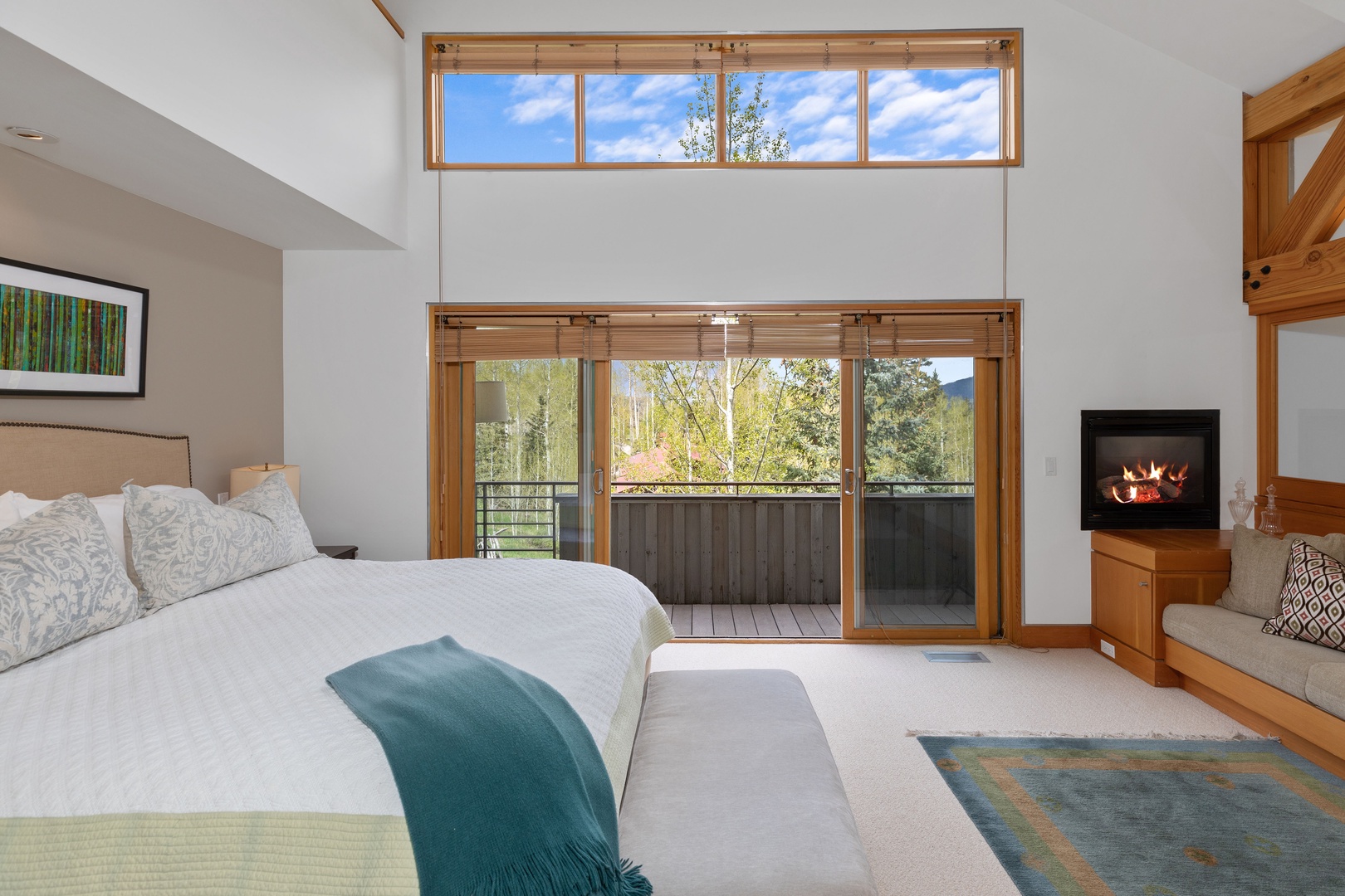 Bedroom 1 - Primary bedroom with king bed, fireplace and private deck