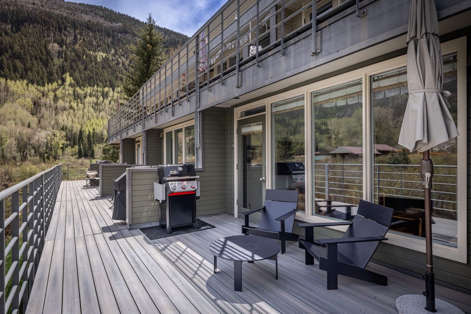 Updated exterior with new BBQ and umbrella