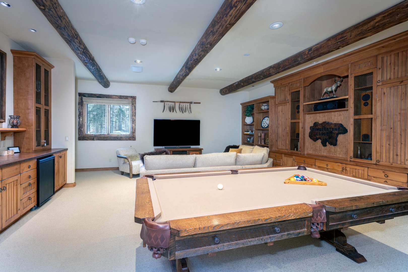 Game Room - Lower Level - Game room with pool table, wet bar and TV