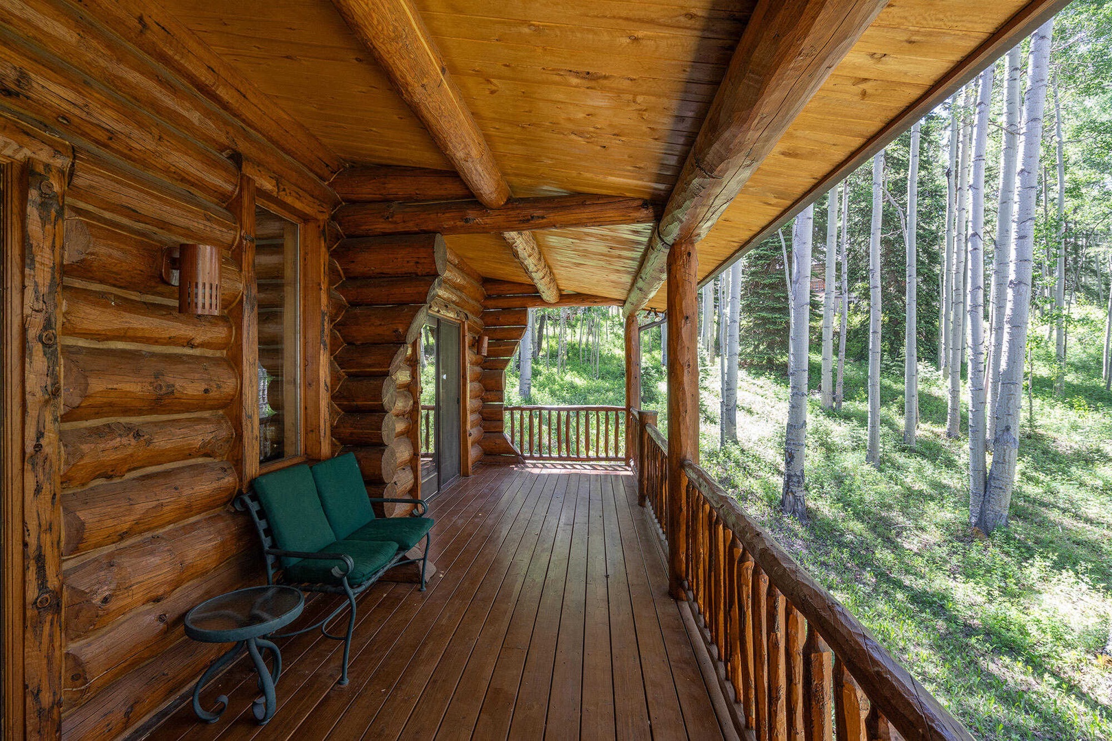 Deck - Wrap around deck with seating and forest views