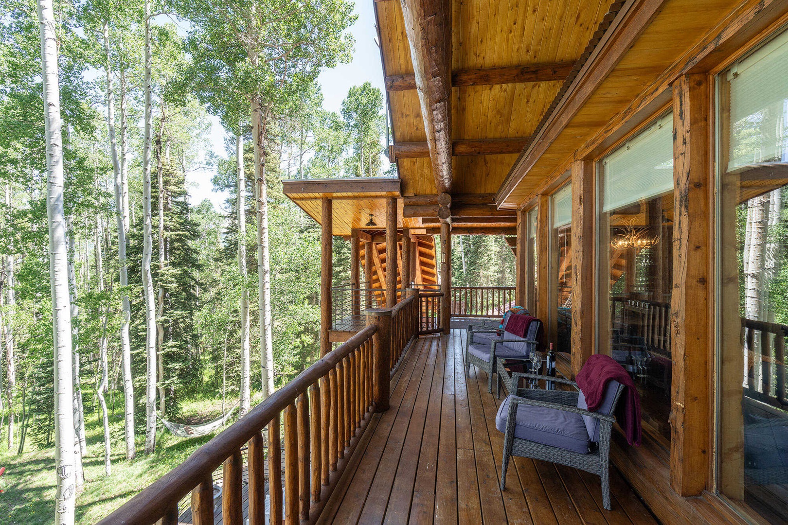 Deck - Wrap around deck with seating and forest views