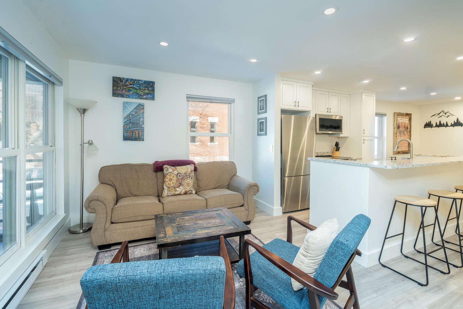 Living Room - Open concept floor plan with living room seating for 4