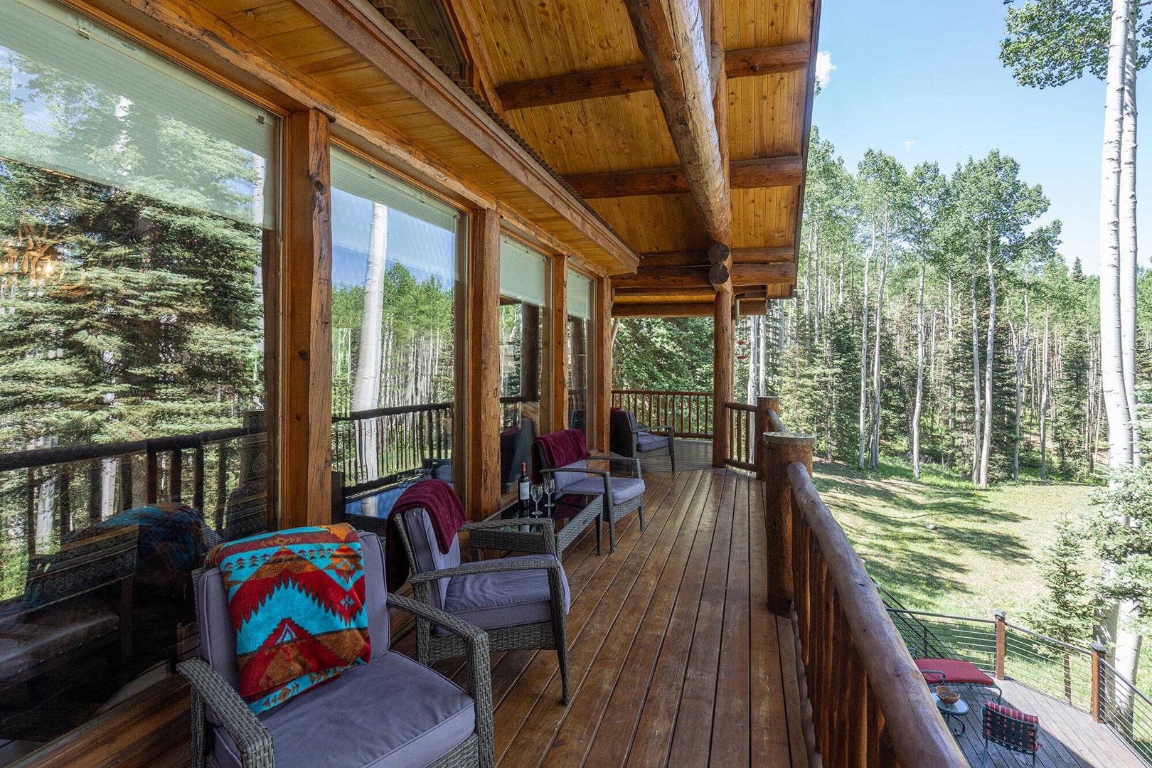 Deck - Wrap around deck with seating and forest views