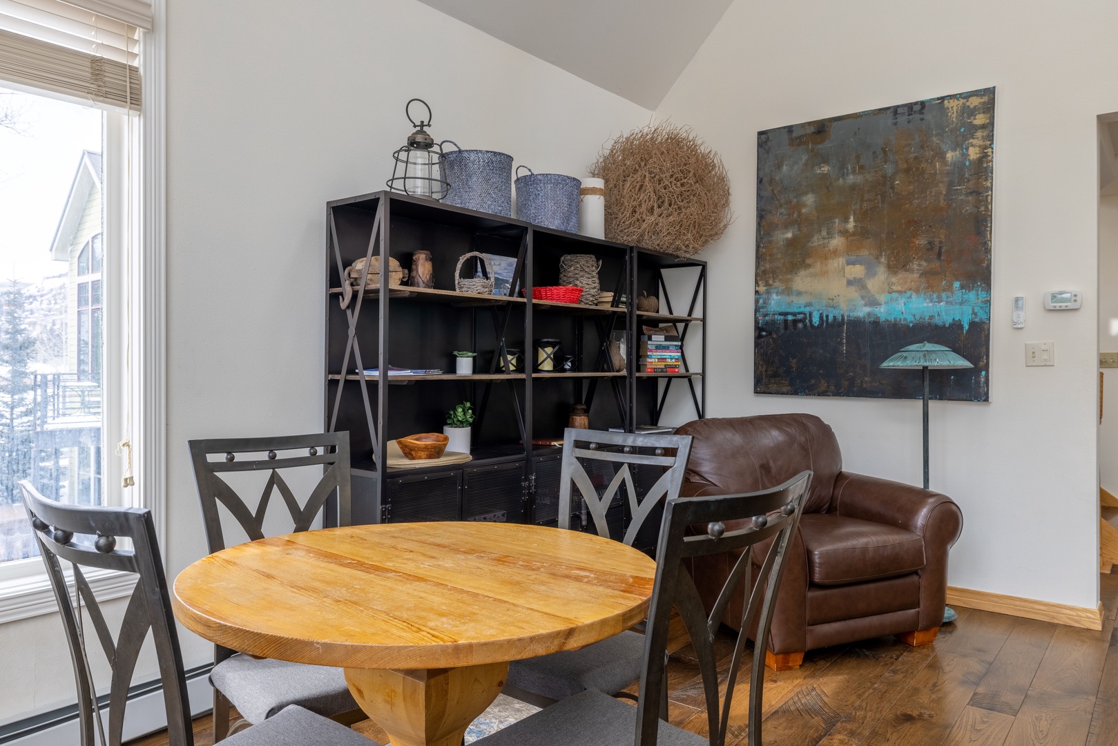 Breakfast nook in the morning, game table by night