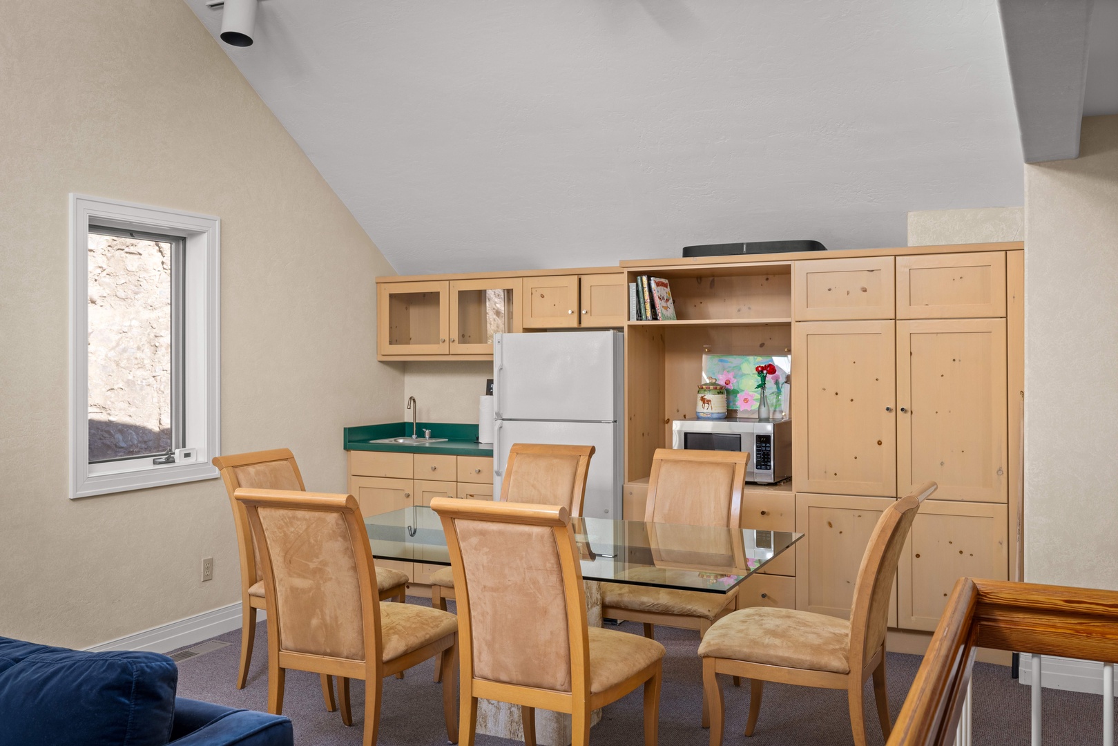 Upstairs media room with adjoining kitchenette