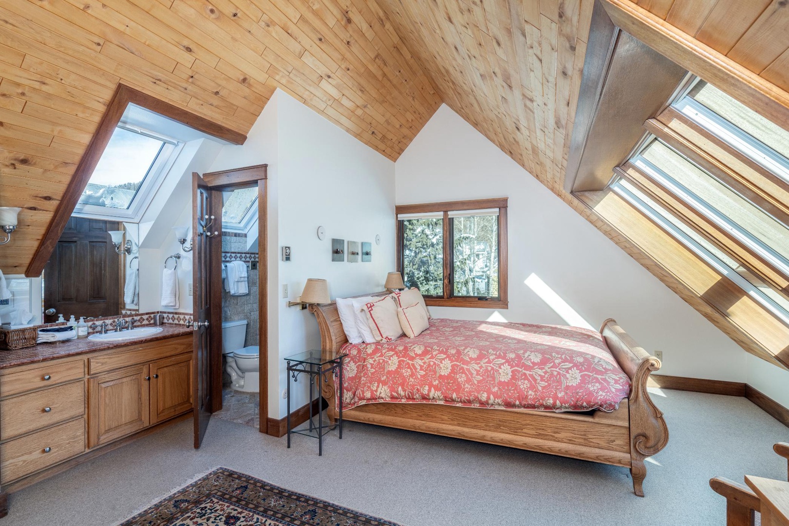 Top Floor Primary bedroom with king bed and ensuite bath