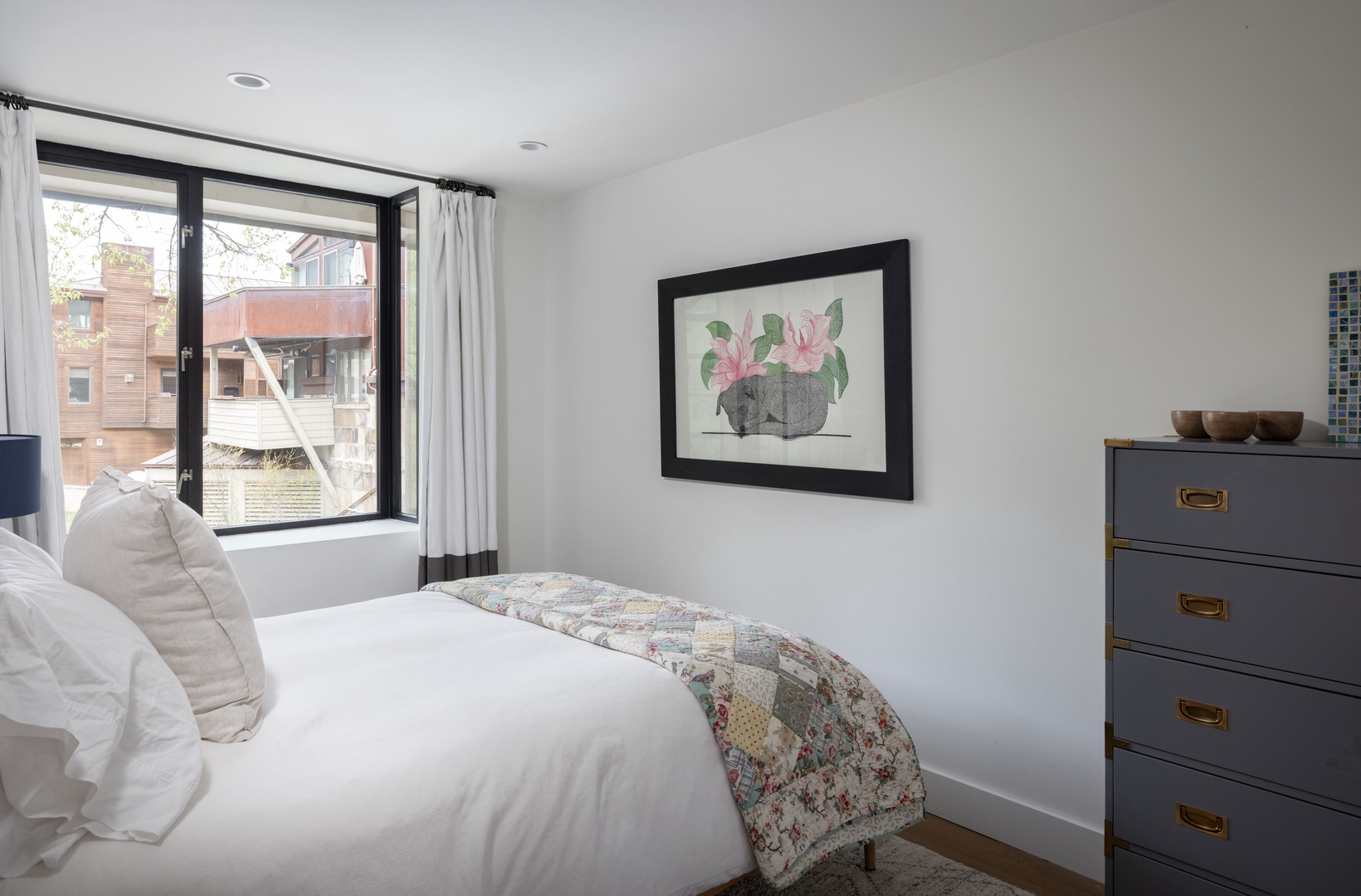 Bedroom 1 - Queen Bed and gallery window seat