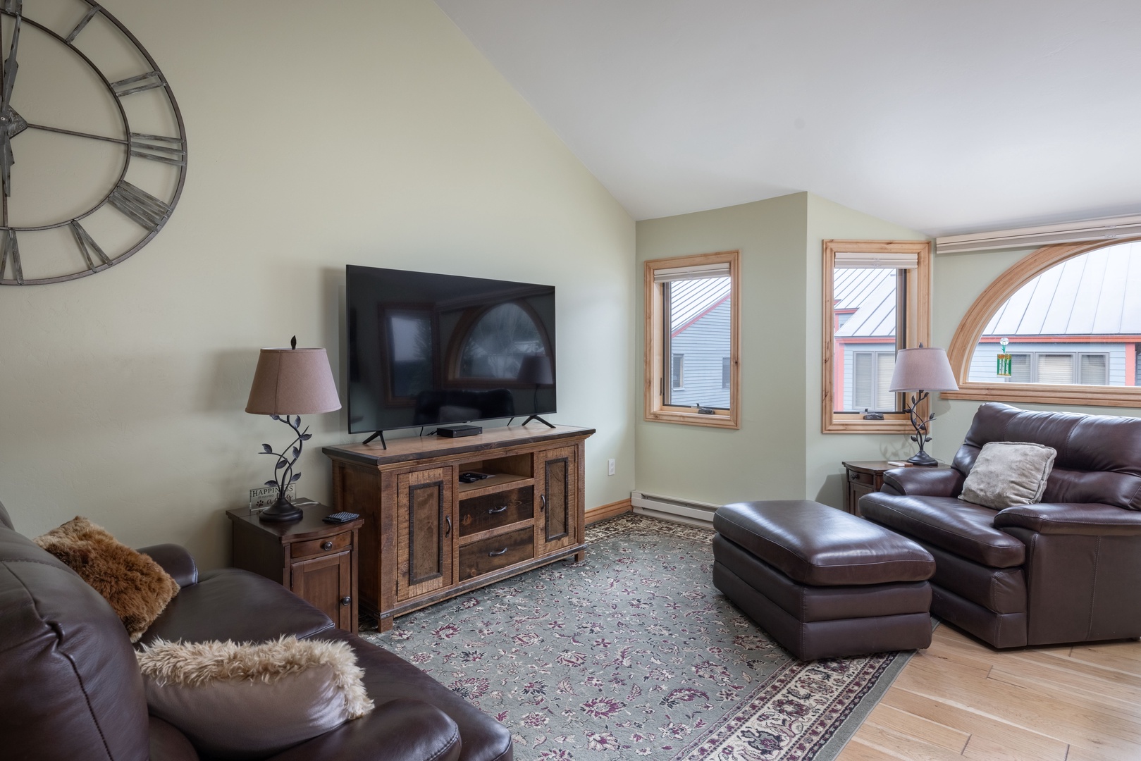 Spacious living room with vaulted ceilings and amazing views of Ballard Peak