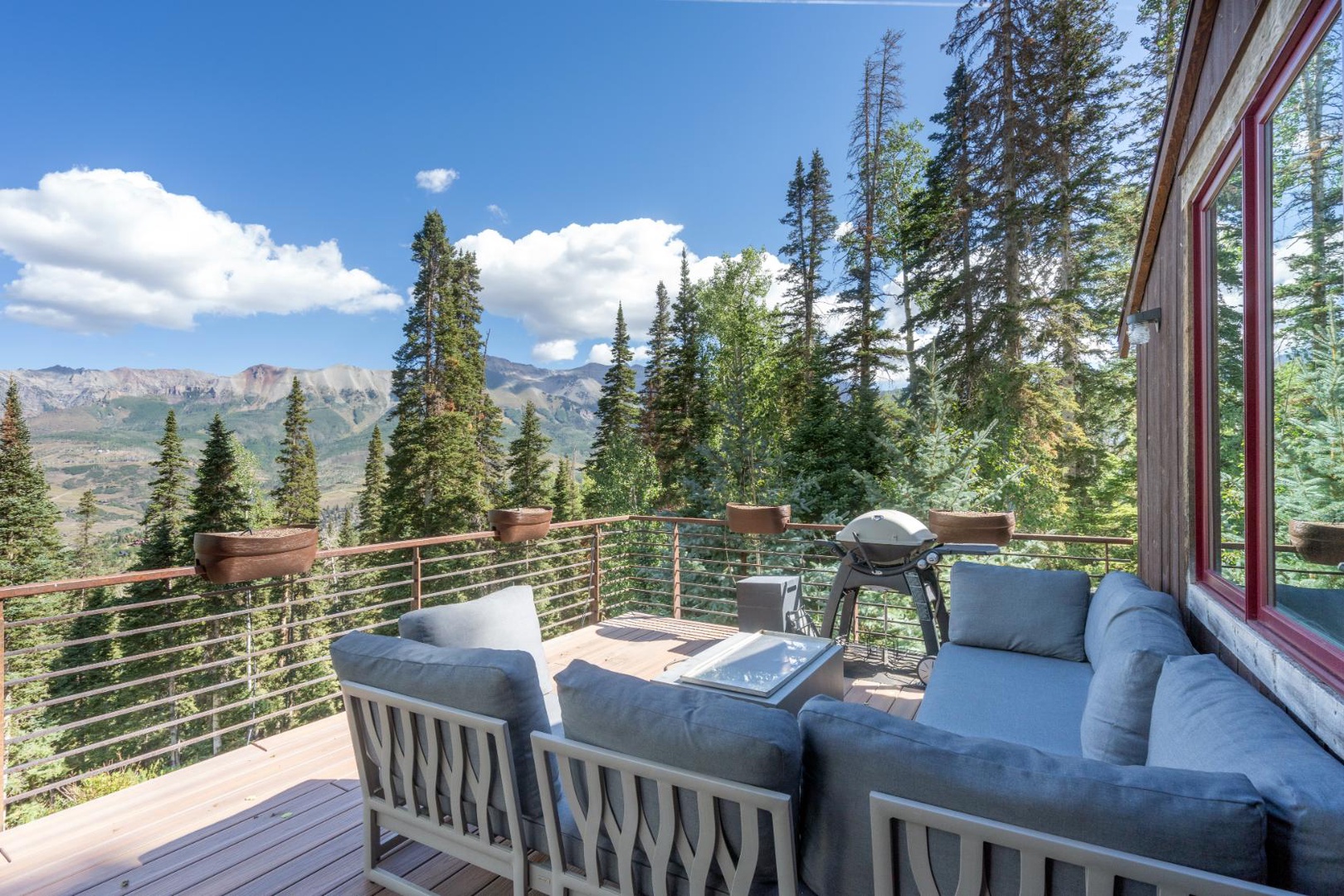 Main level deck with seating, BBQ and more