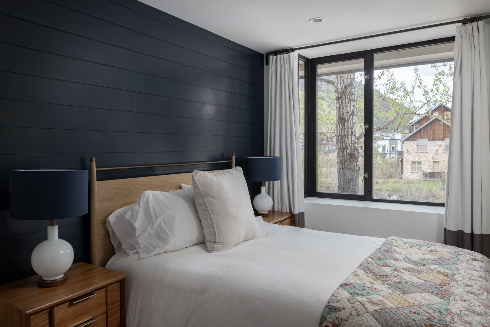 Bedroom 1 - Queen Bed and gallery window seat