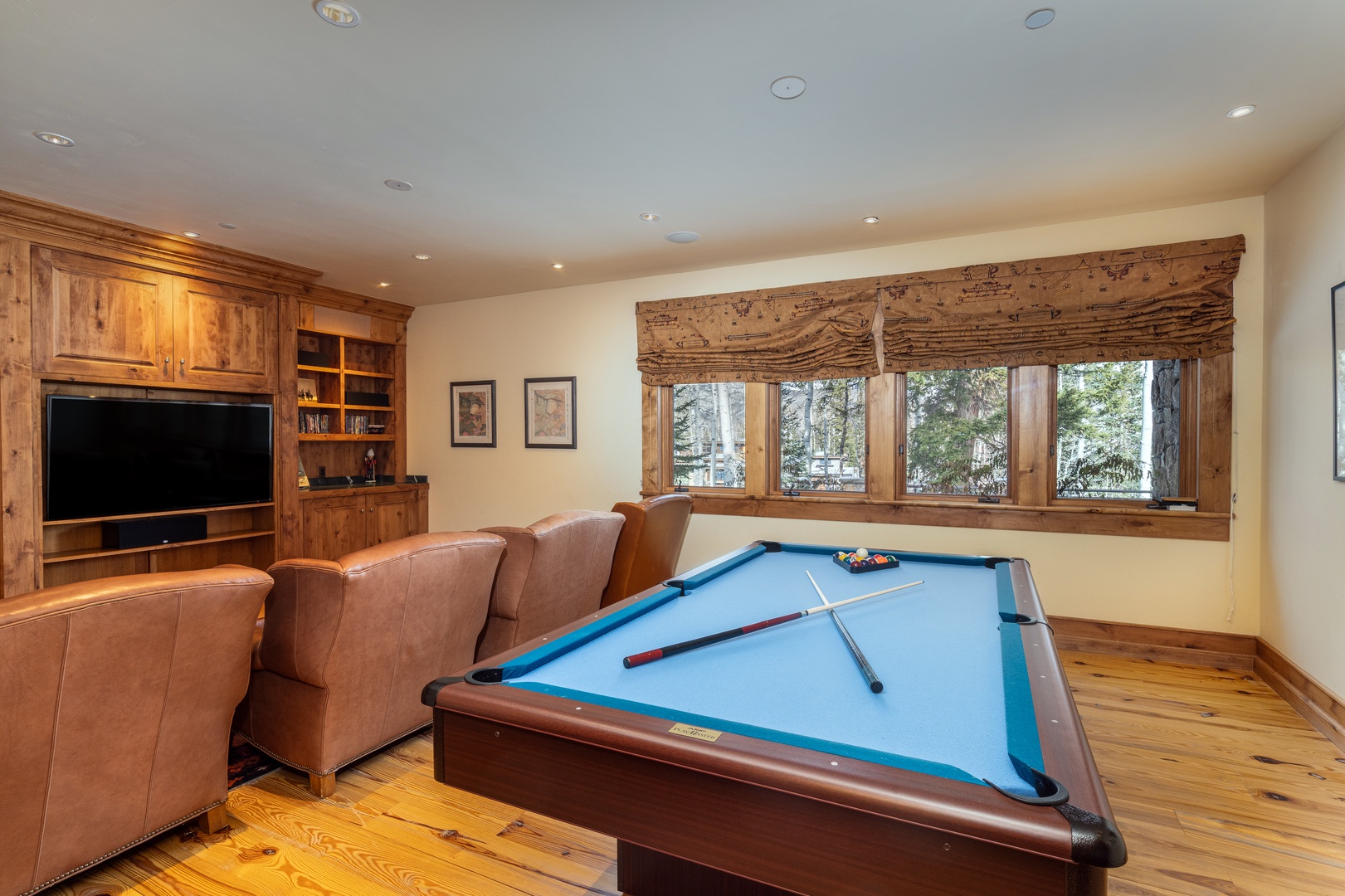 Lower media room with full size pool table