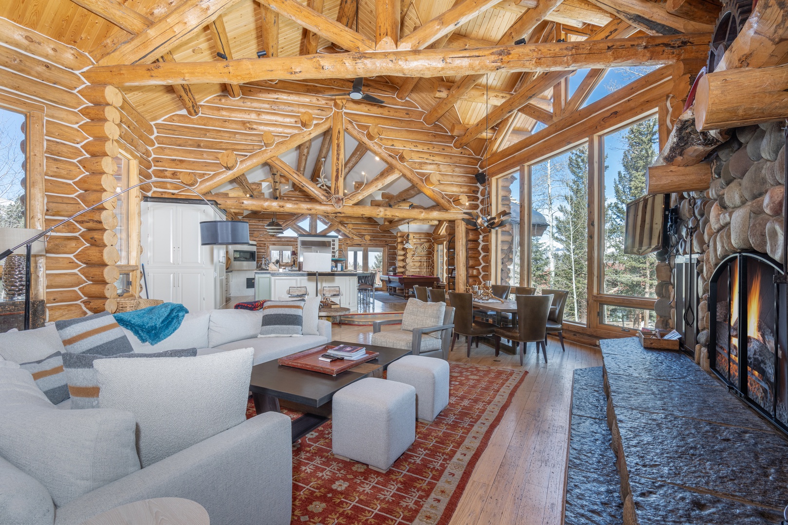 Vaulted log ceilings throughout main level