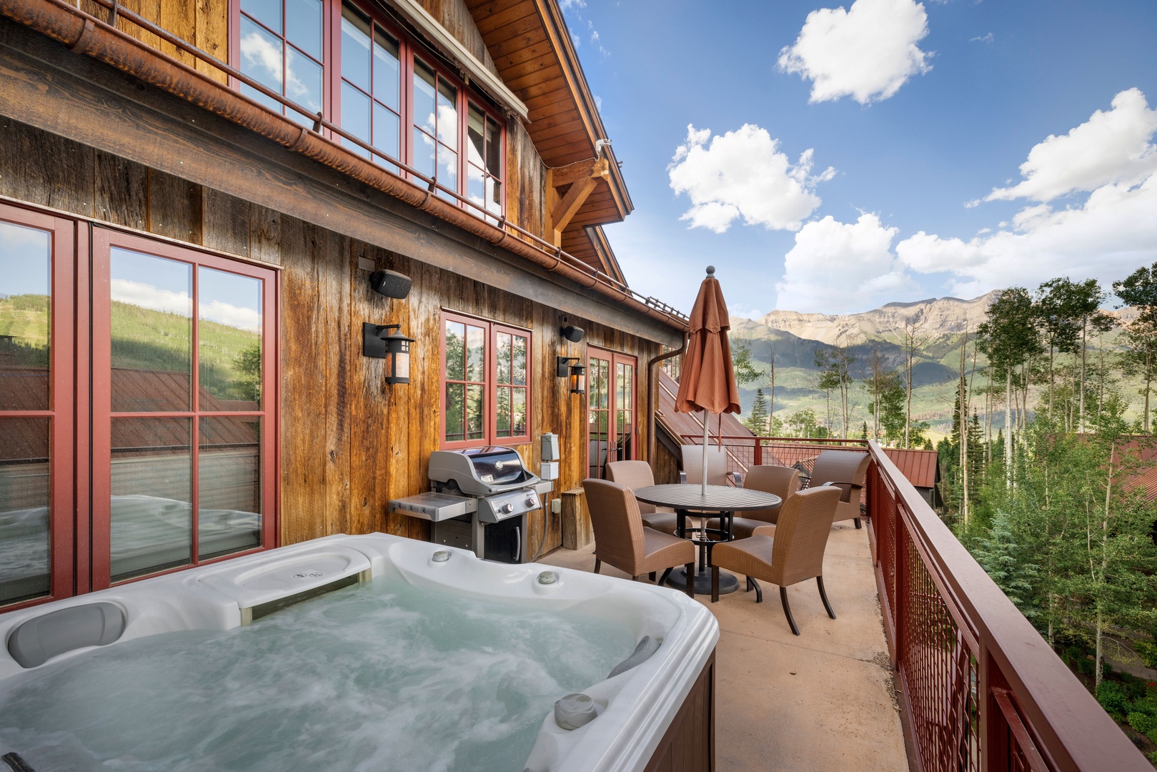 Private heated deck with a private hot tub and BBQ