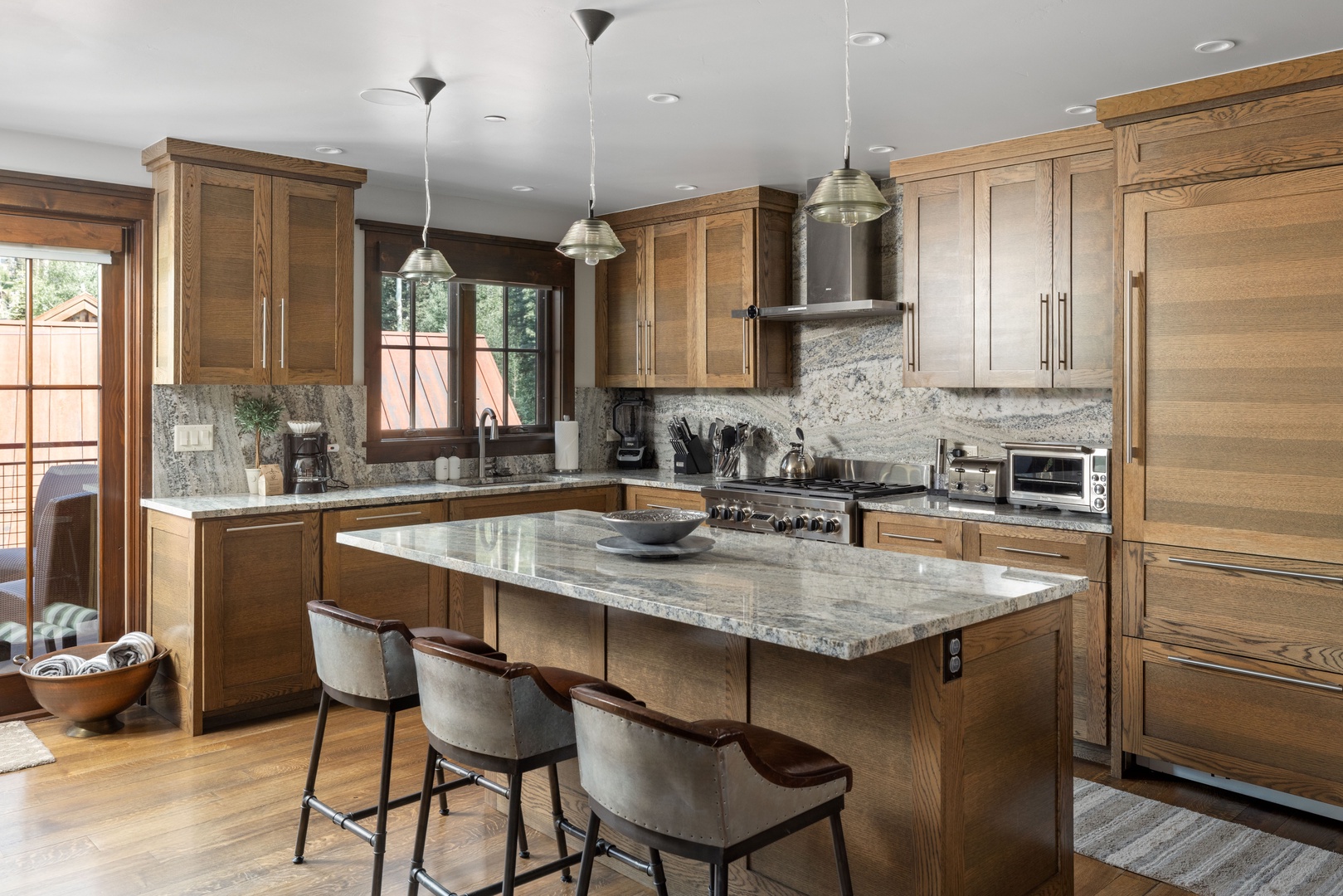 Massive stone kitchen island welcome you home