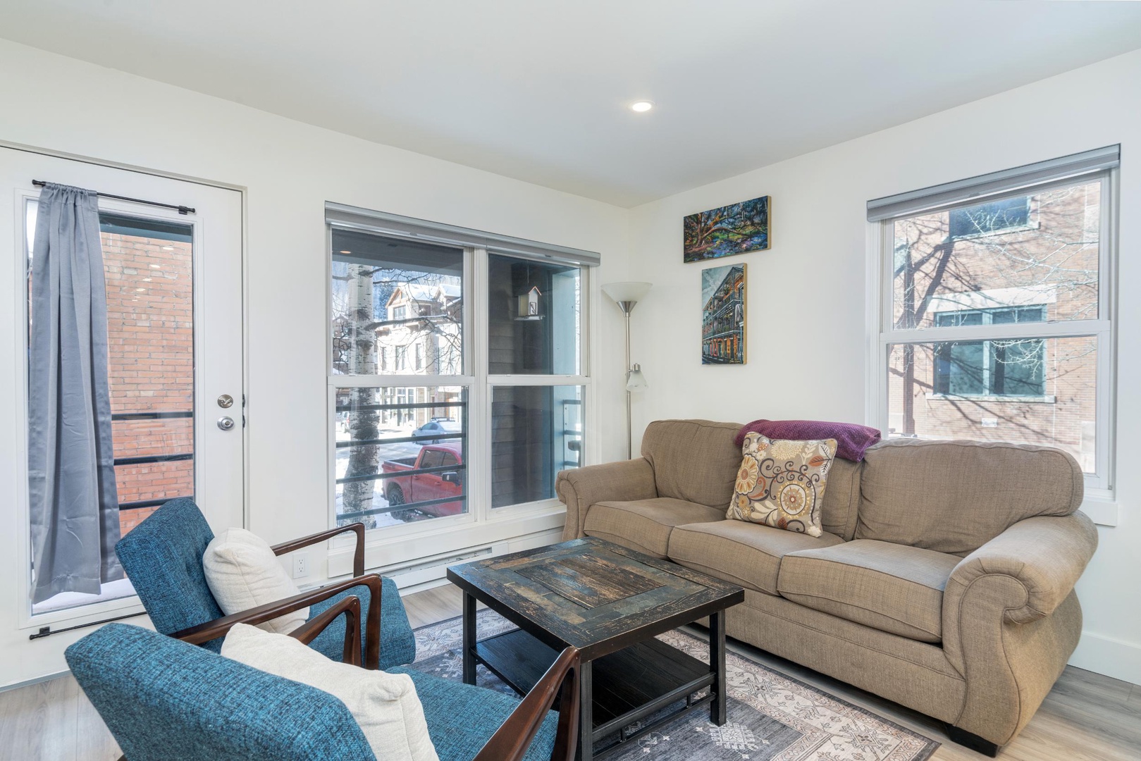 Living Room - Open concept floor plan with living room seating for 4