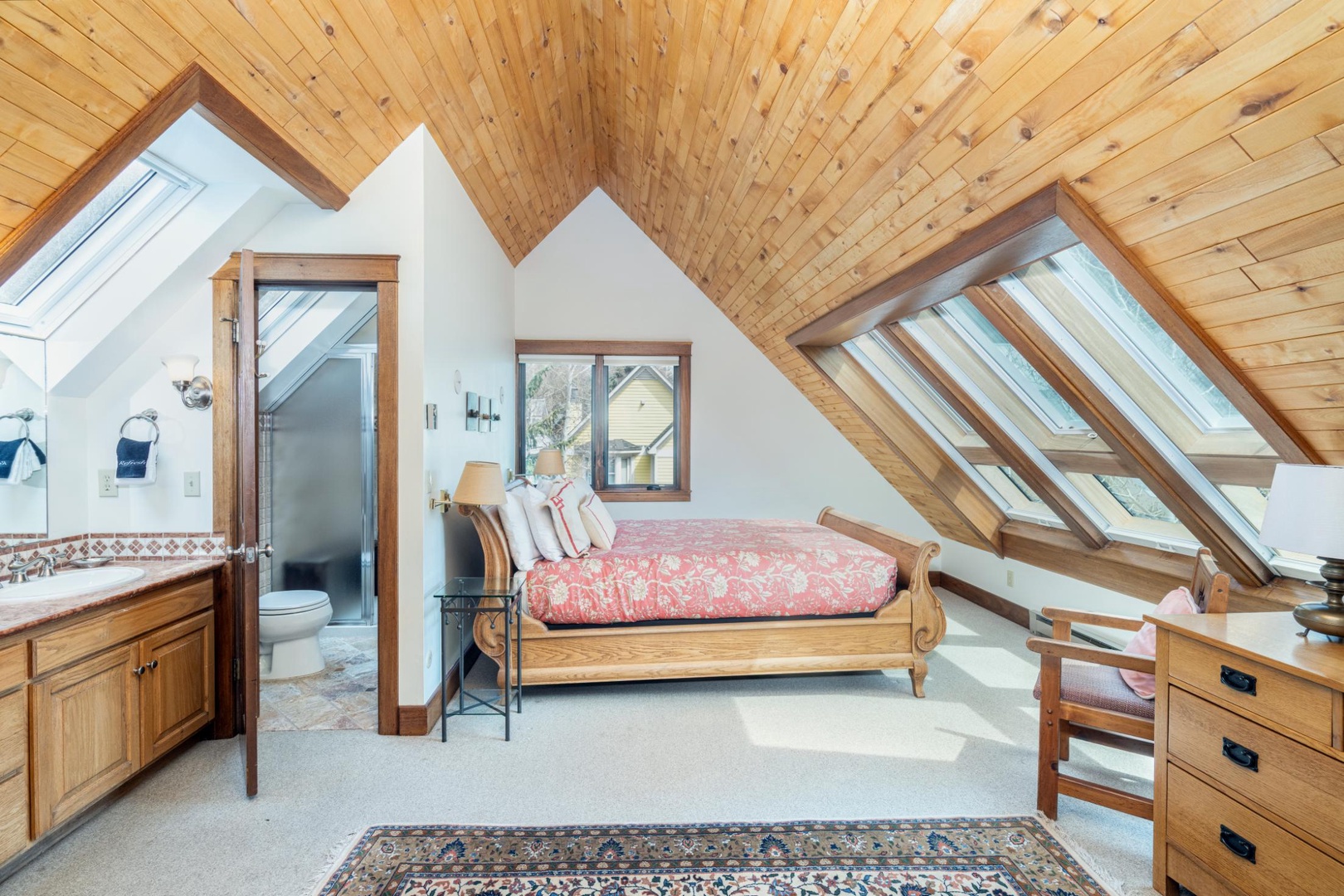 Top Floor Primary bedroom with king bed and ensuite bath