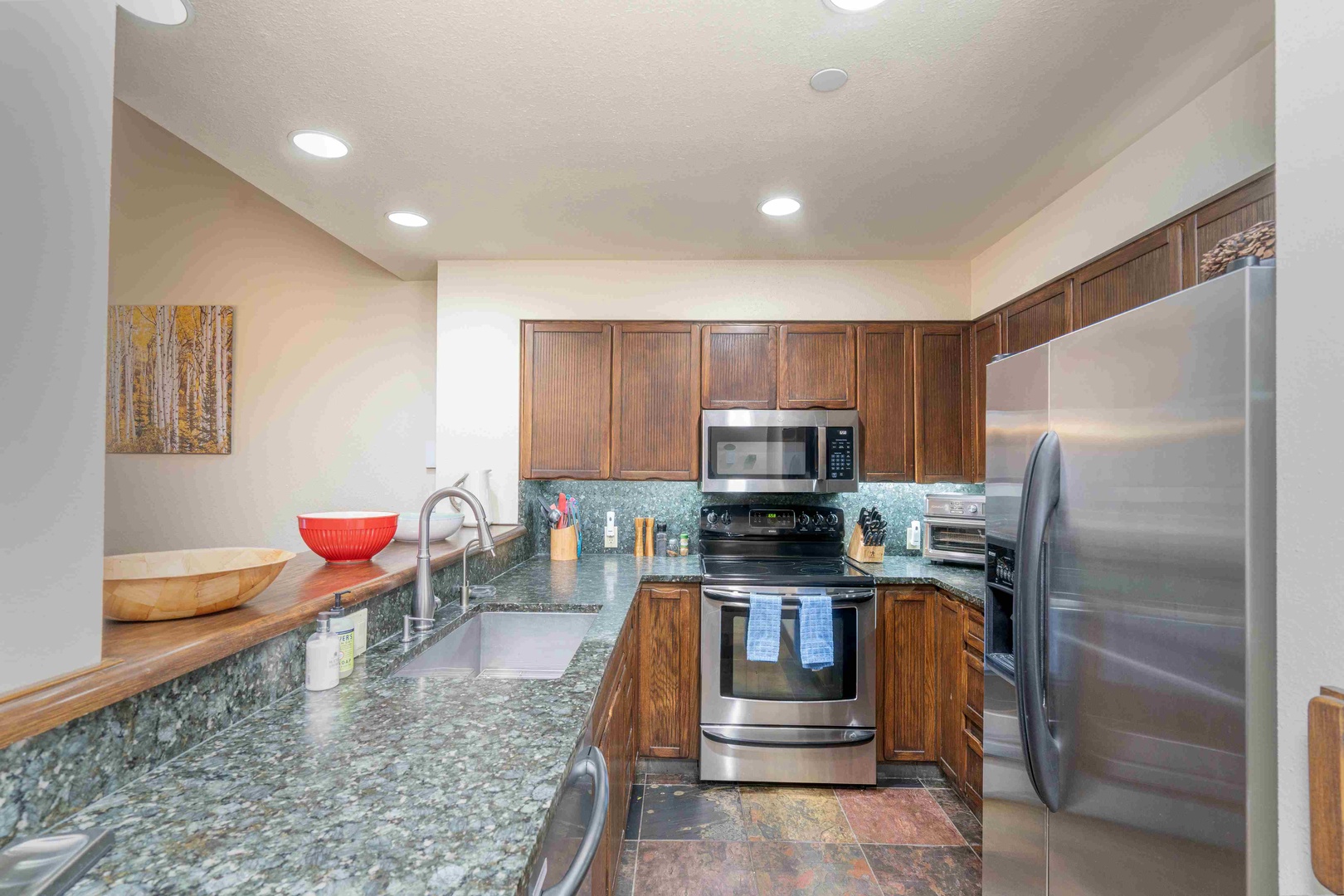 Fully stocked kitchen with new oven and refrigerator