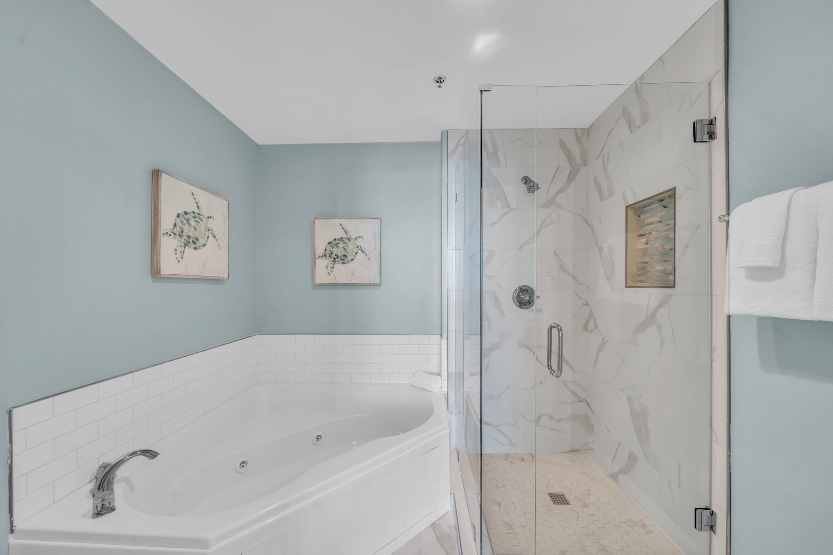 The Primary Bedroom features a private bathroom with a Jacuzzi Tub and a separate Glass Shower.