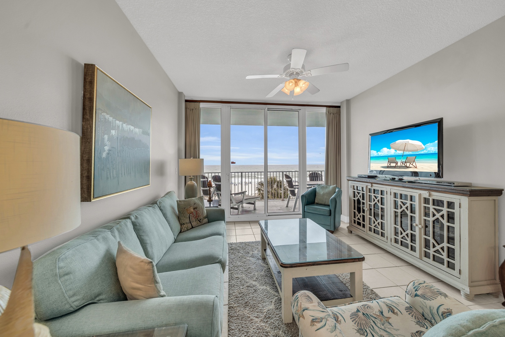 Living room with Gulf views and balcony access