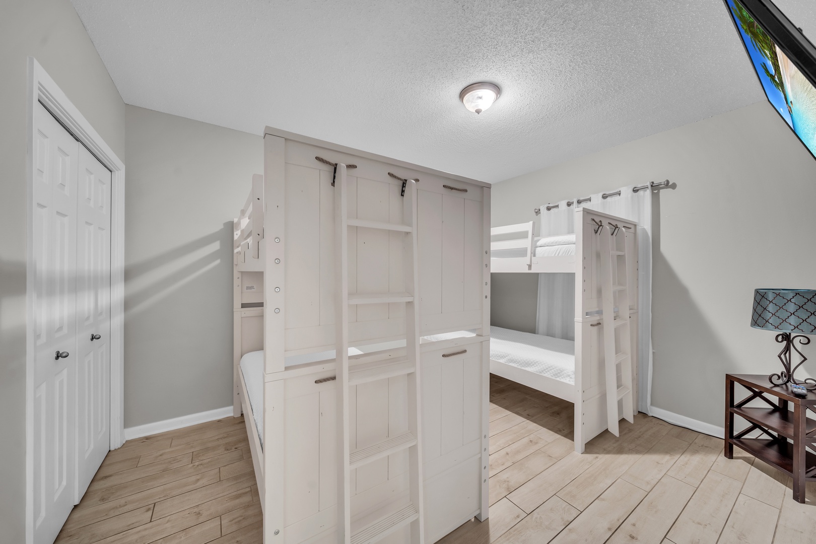 The second Guest Bedroom, a haven for the younger ones, features two sets of Bunk Beds with twin-size mattresses, accommodating an additional 4 people.