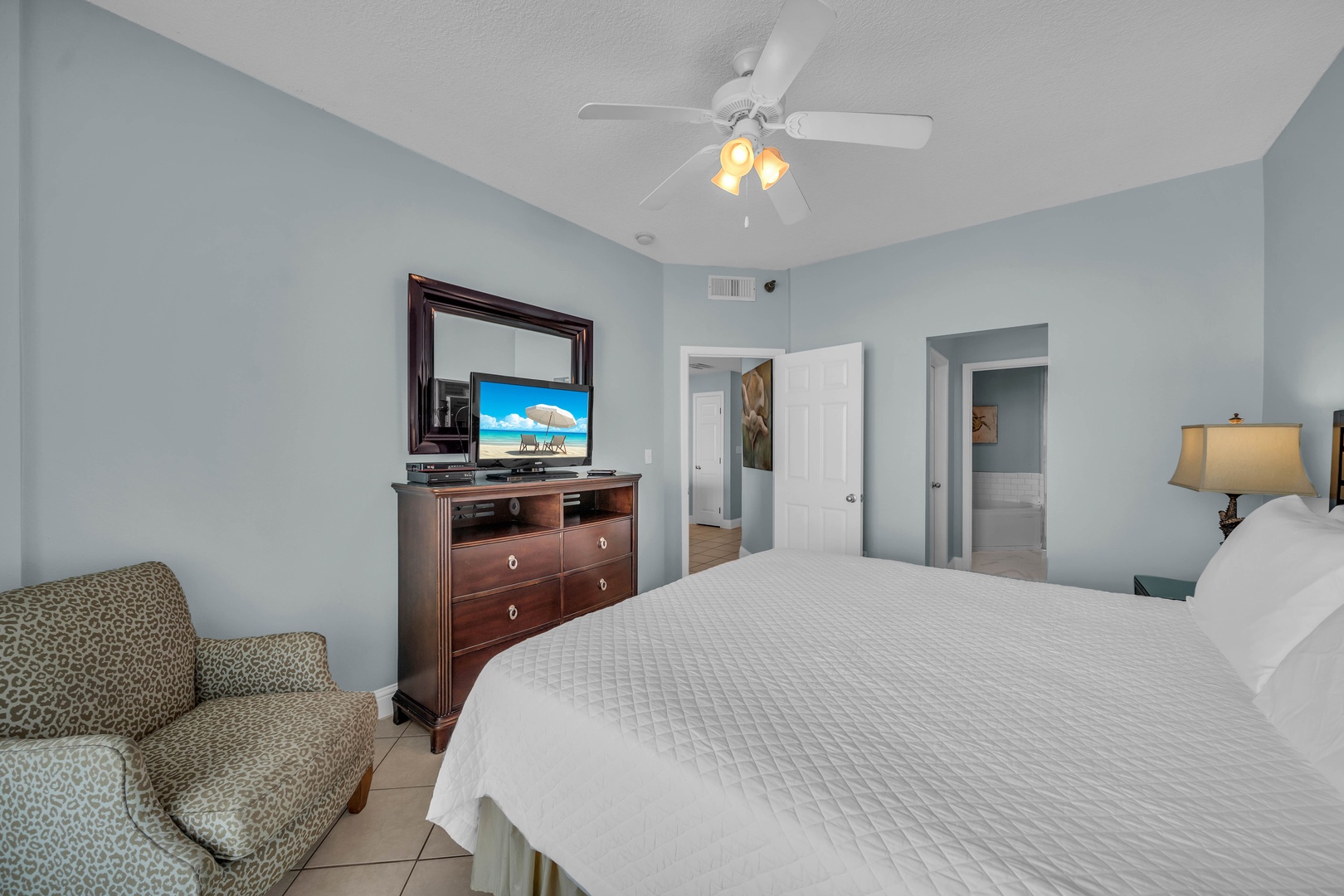 The Primary Bedroom features a HD Flat Screen TV and a large walk-in closet.
