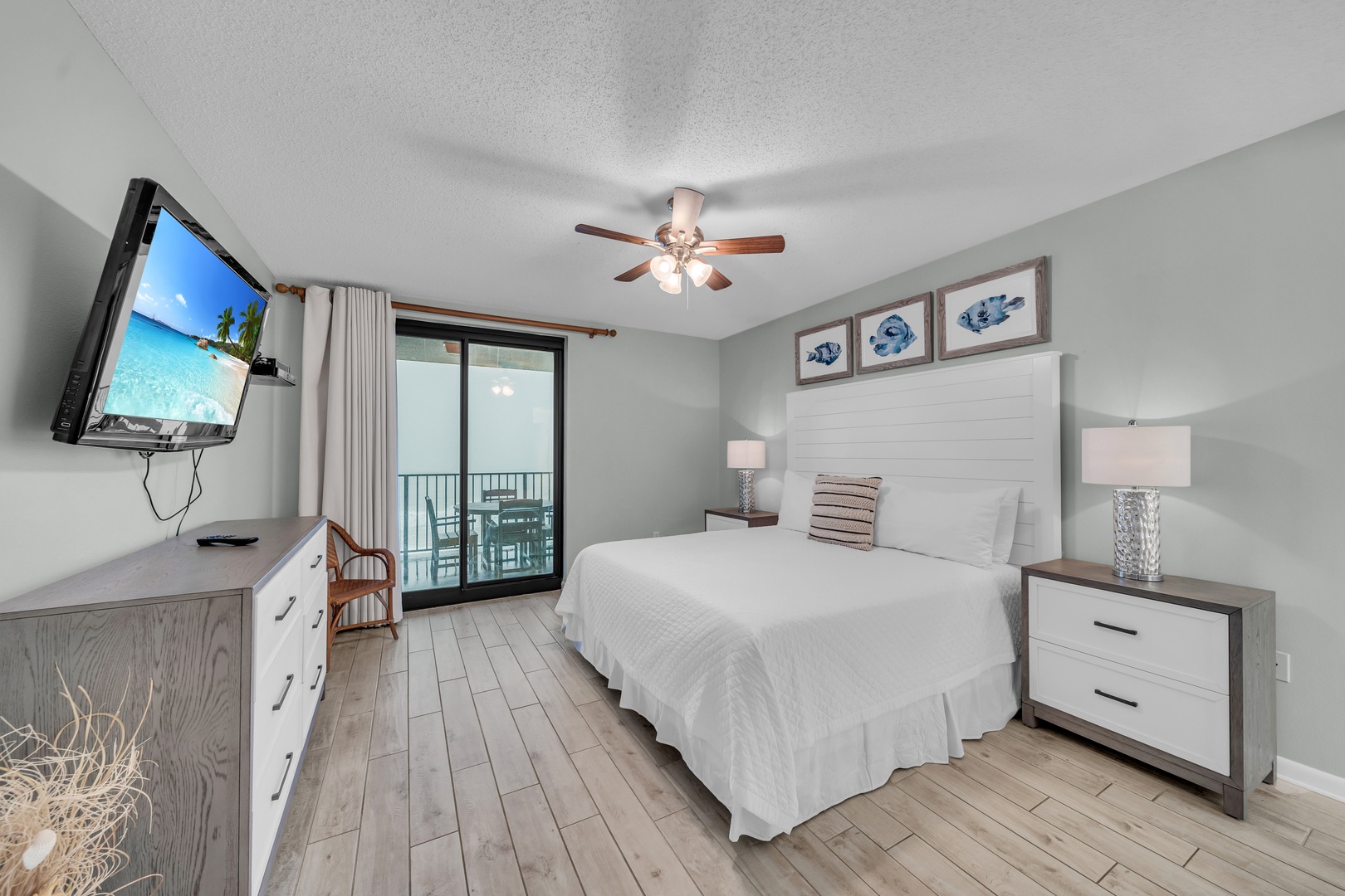 The Primary Bedroom, a serene sanctuary, also features sliding glass doors opening onto the balcony with Gulf views.