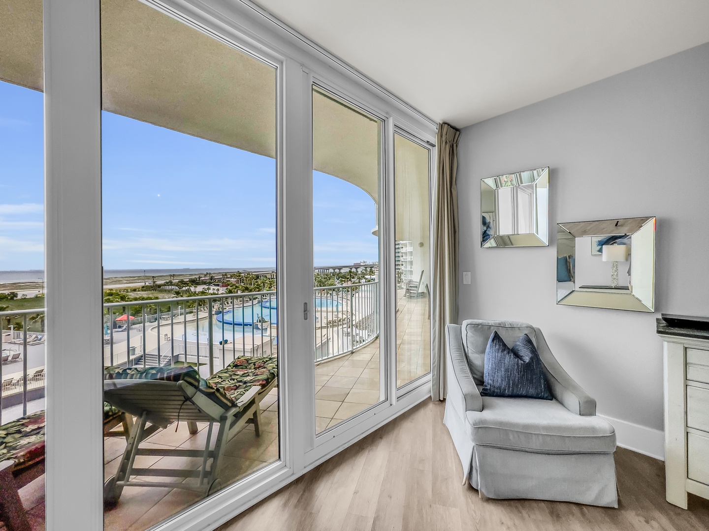 Primary bedroom with balcony access