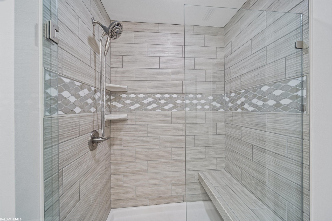 Primary bedroom with oversized walk in shower