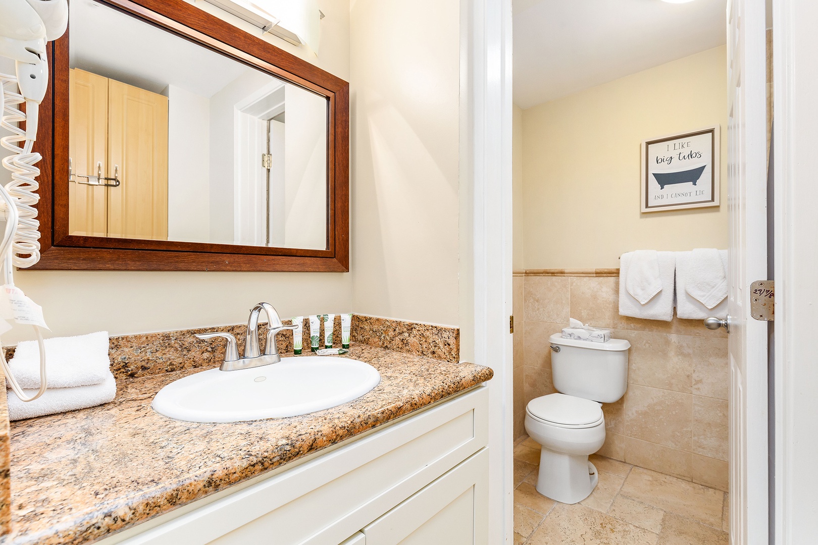 Freshen up at your granite vanity, with plush towels and a whimsical 