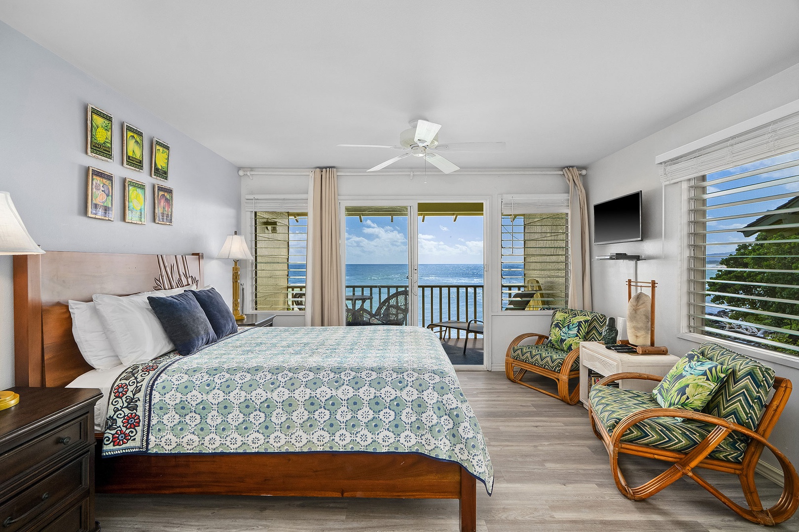 Wake up to stunning ocean views from your private retreat, where tropical breezes flow through and comfortable seating invites relaxation.