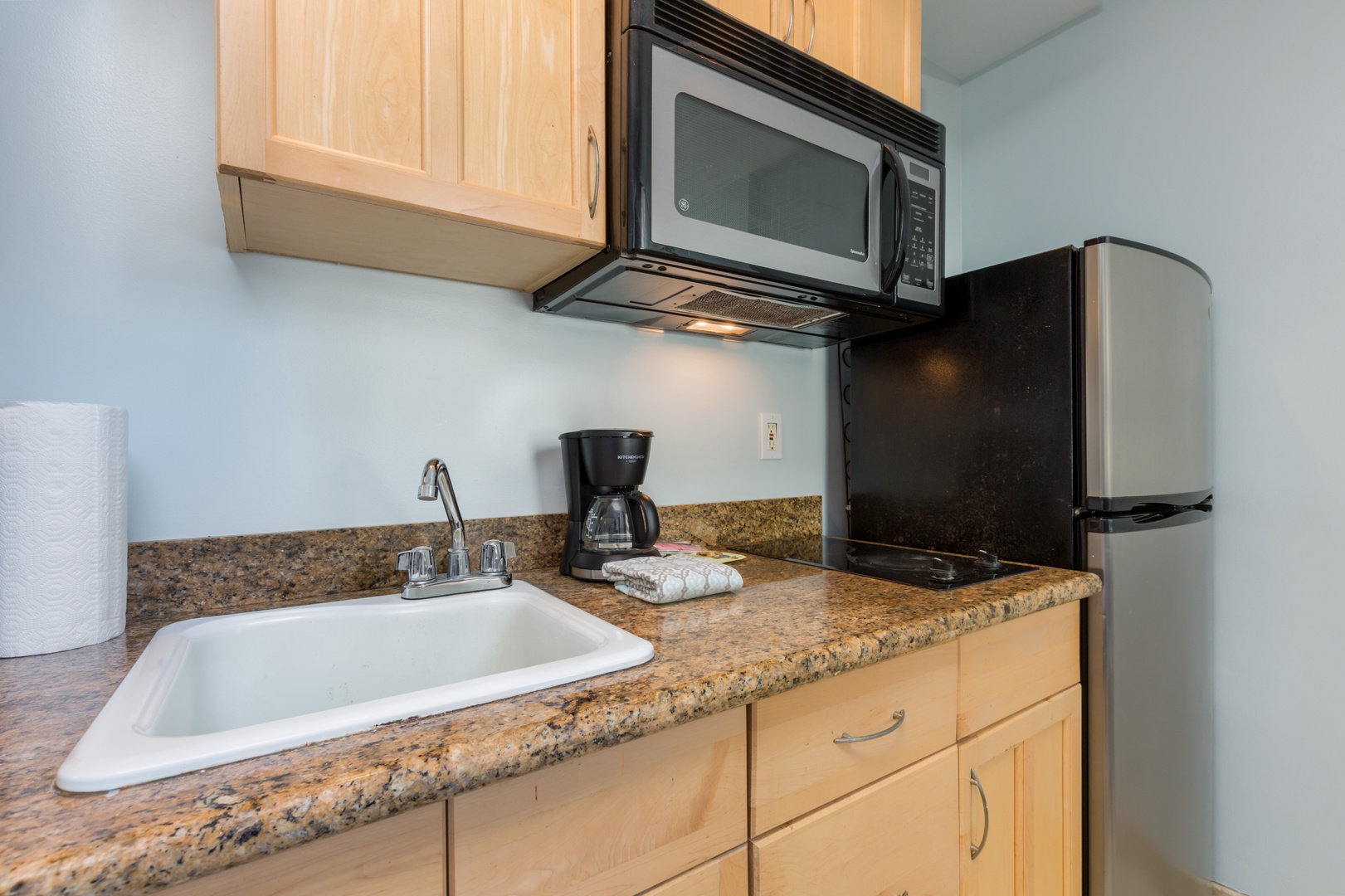 Your kitchenette has everything you need to brew morning coffee or prepare quick bites, with a microwave, fridge, and sink all within easy reach.