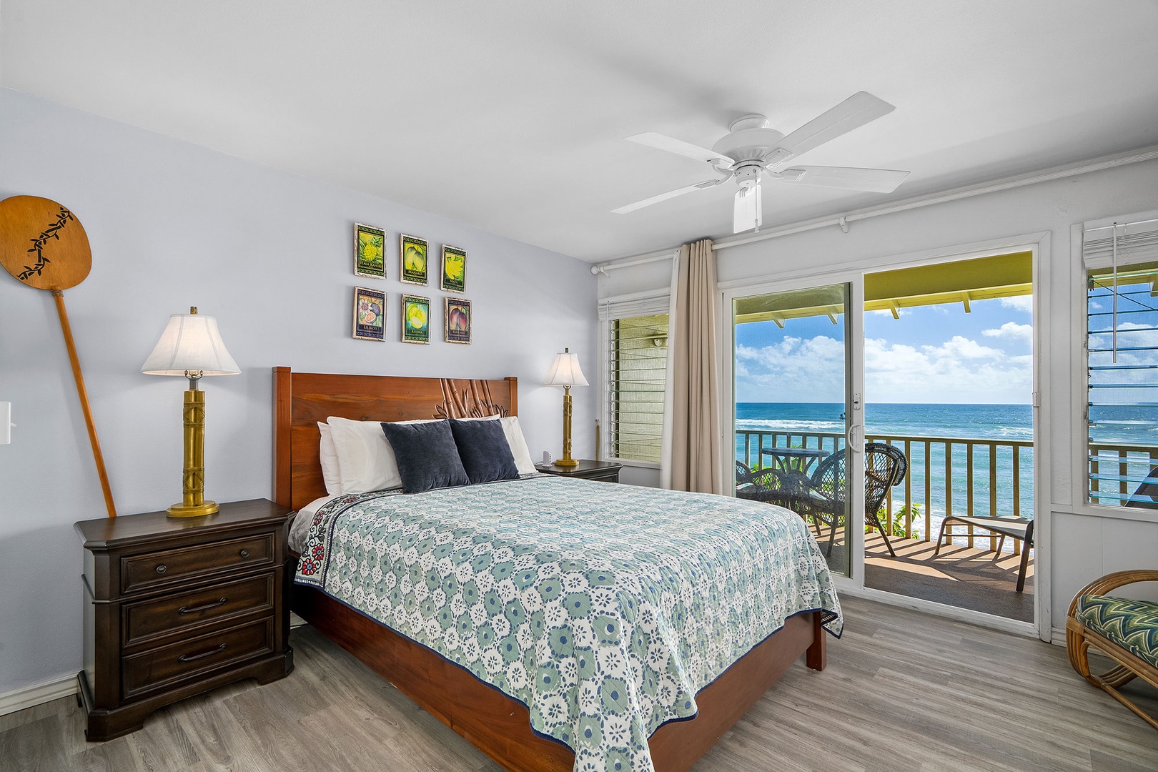 Wake up to stunning ocean views from your comfortable bedroom, where tropical breezes flow through open doors to your private balcony overlooking paradise.