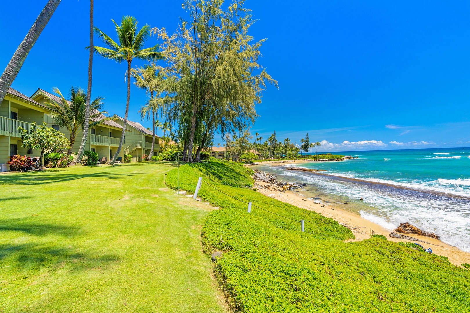 Oceanfront property with lush tropical grounds leading directly to pristine beach. Crystal-clear waters and swaying palms create the perfect island escape.