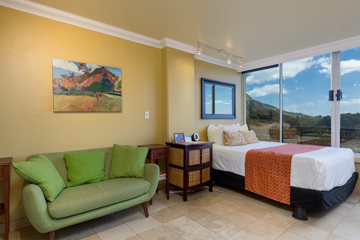 Wake to mountain views framed by floor-to-ceiling glass in your bright studio. Unwind on the cozy sofa or step onto your private balcony to breathe in the scenery.