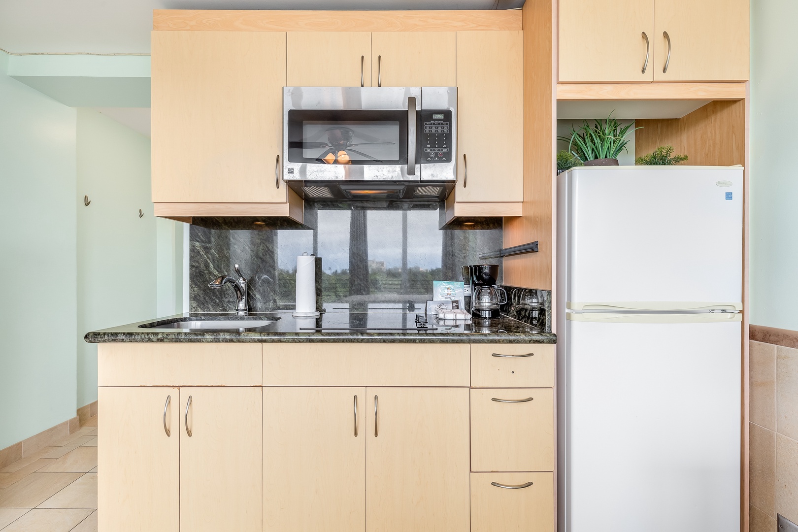 Your kitchenette is equipped with everything you need to prepare light meals and enjoy morning coffee. The full-size refrigerator, microwave, and coffee maker make self-catering convenient.