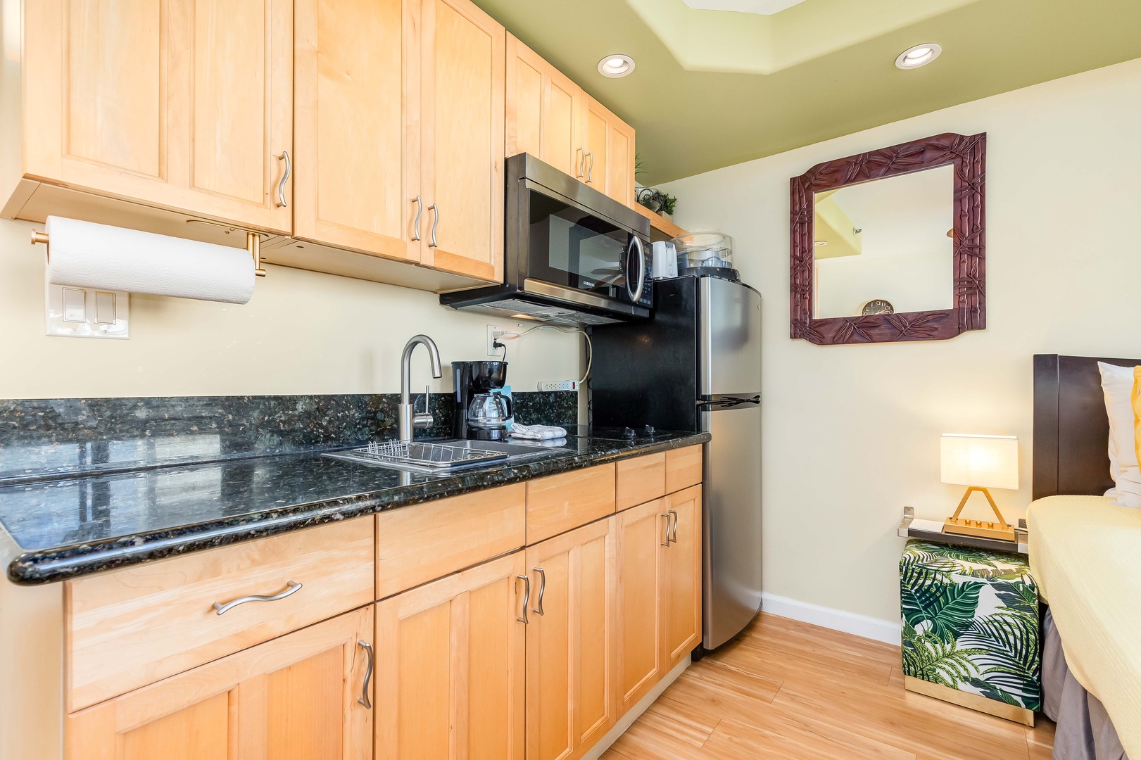 Your kitchenette comes fully equipped with sleek granite countertops, modern appliances, and everything you need to prepare meals at your own pace during your stay.