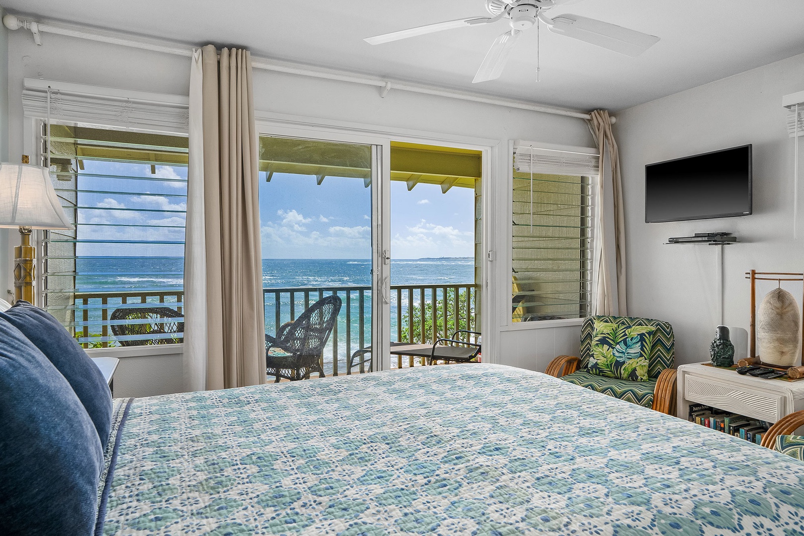 Wake up to endless ocean views from your bed, where sea breezes and tropical comfort create your perfect beachfront retreat.