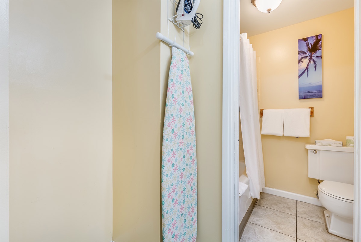 Your private bathroom features fresh towels, tropical touches, and a bright, clean space ready for your arrival and daily refresh.