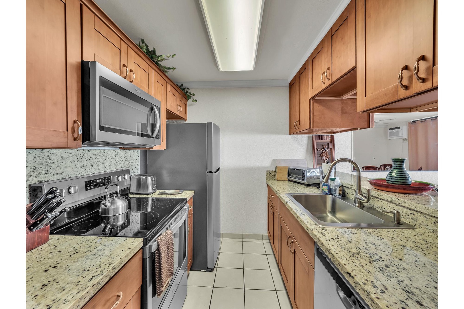 Your fully equipped kitchen features granite countertops, stainless steel appliances, and all the cookware you need for memorable home-cooked meals during your stay.
