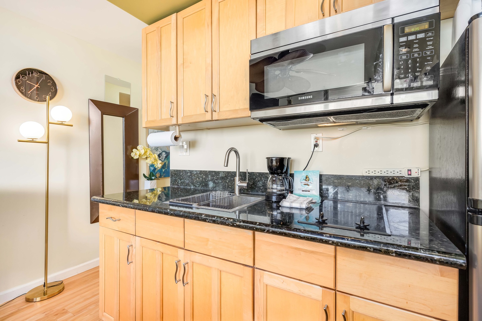 Your fully equipped kitchen features modern appliances and sleek granite counters, making meal prep a breeze during your stay.