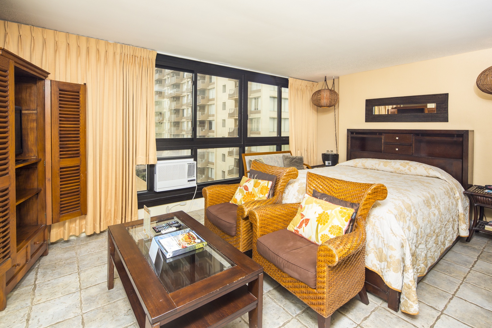 Relax in your inviting bedroom suite, where warm tropical furnishings and abundant natural light create a restful retreat after exploring the island.