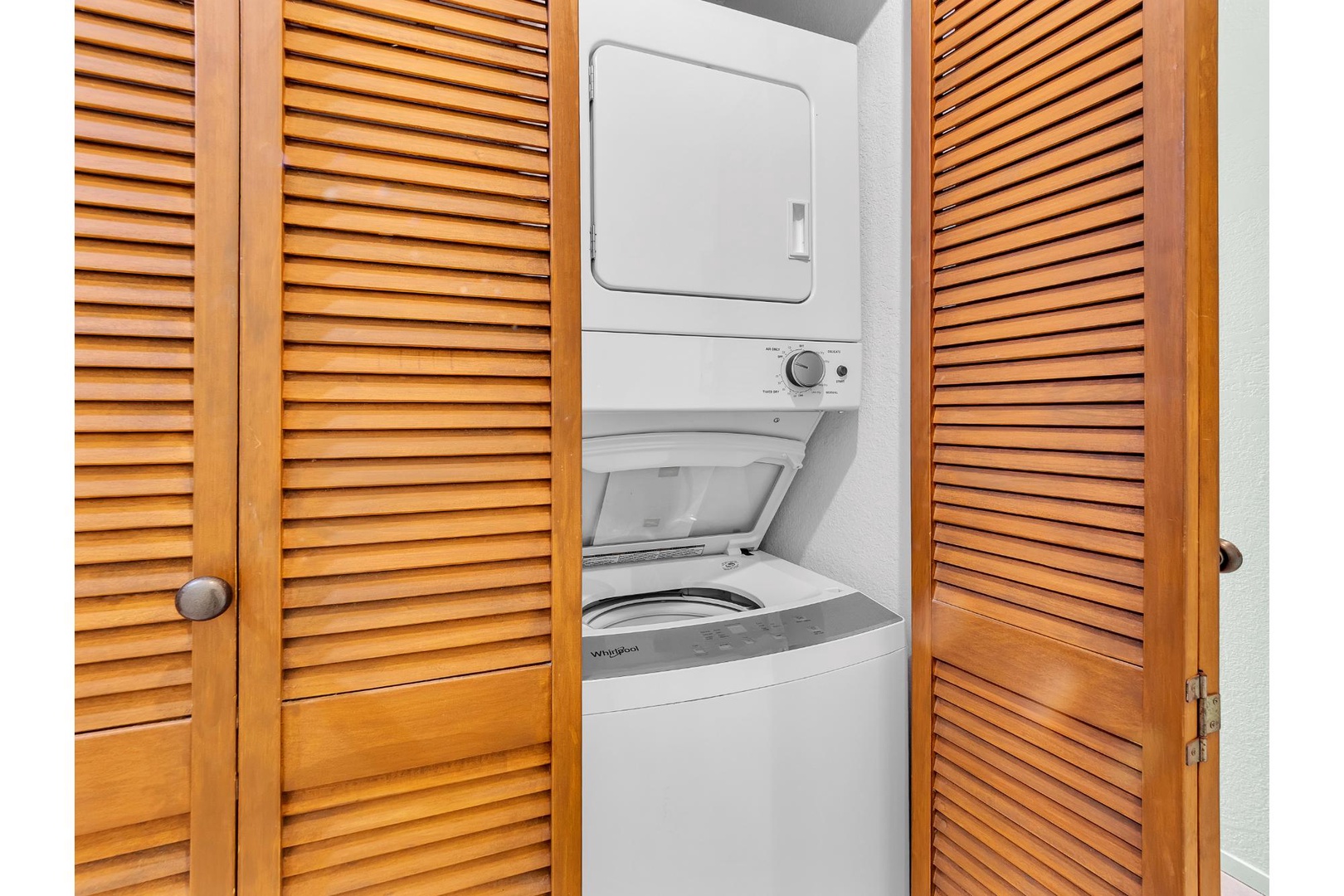 Your own in-unit washer and dryer tucked neatly behind beautiful louvered doors - no more trips to the laundromat during your stay.
