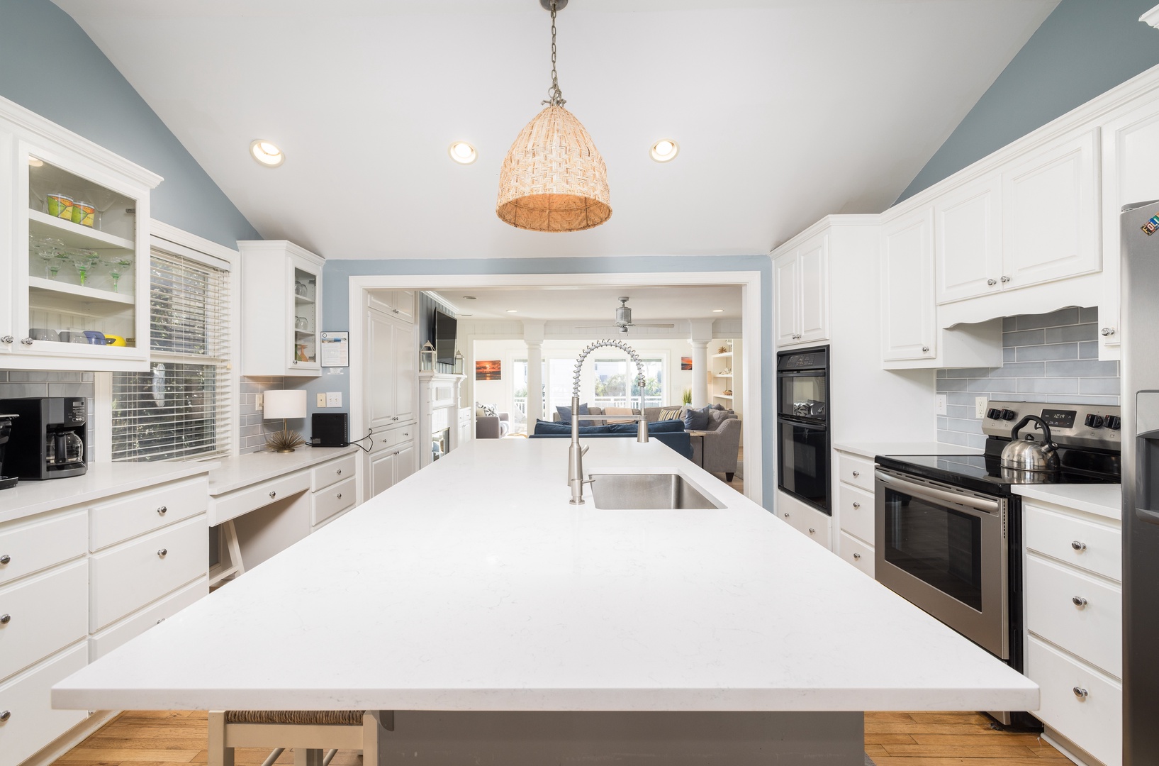 The Blue Pelican | Kitchen Island Looking Toward Living Room