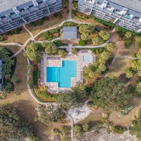 Aerial view of property & pool