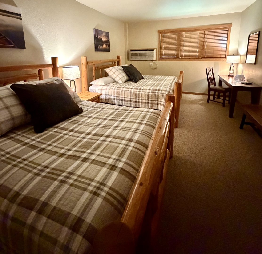 King and queen bed in studio bedroom