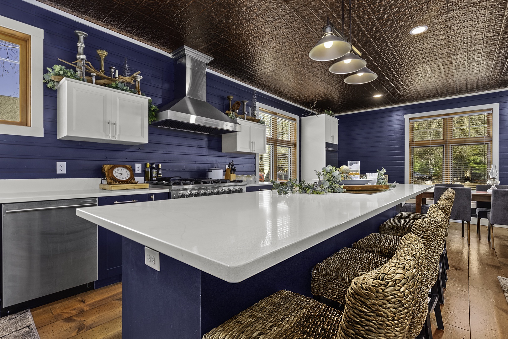 You'll love preparing meals in this stunning gourmet kitchen with its spacious island, professional-grade appliances, and elegant design—perfect for creating unforgettable vacation moments together.