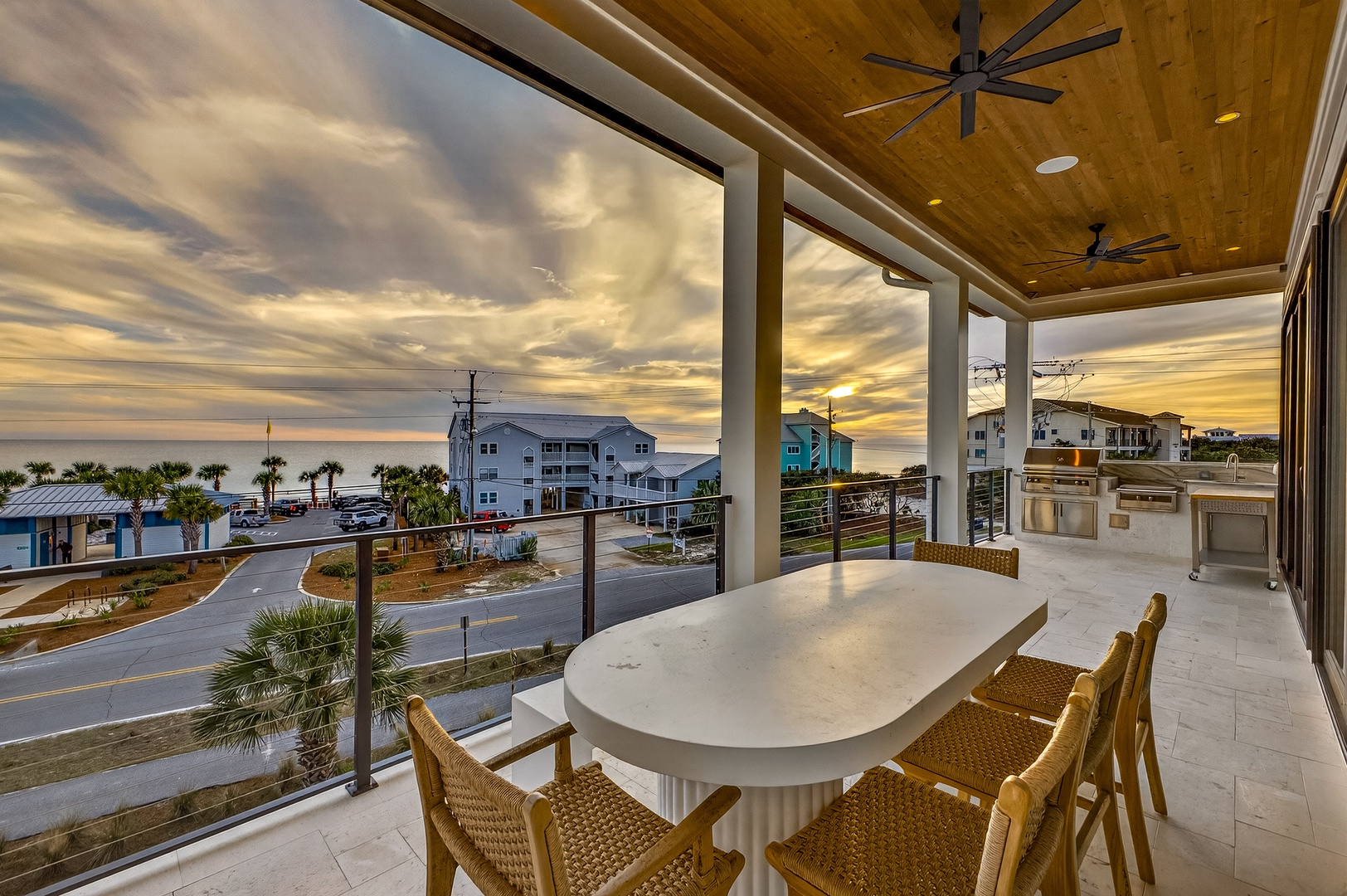 Gather around your private terrace as golden hour paints the sky, creating the perfect backdrop for memorable meals with ocean breezes.