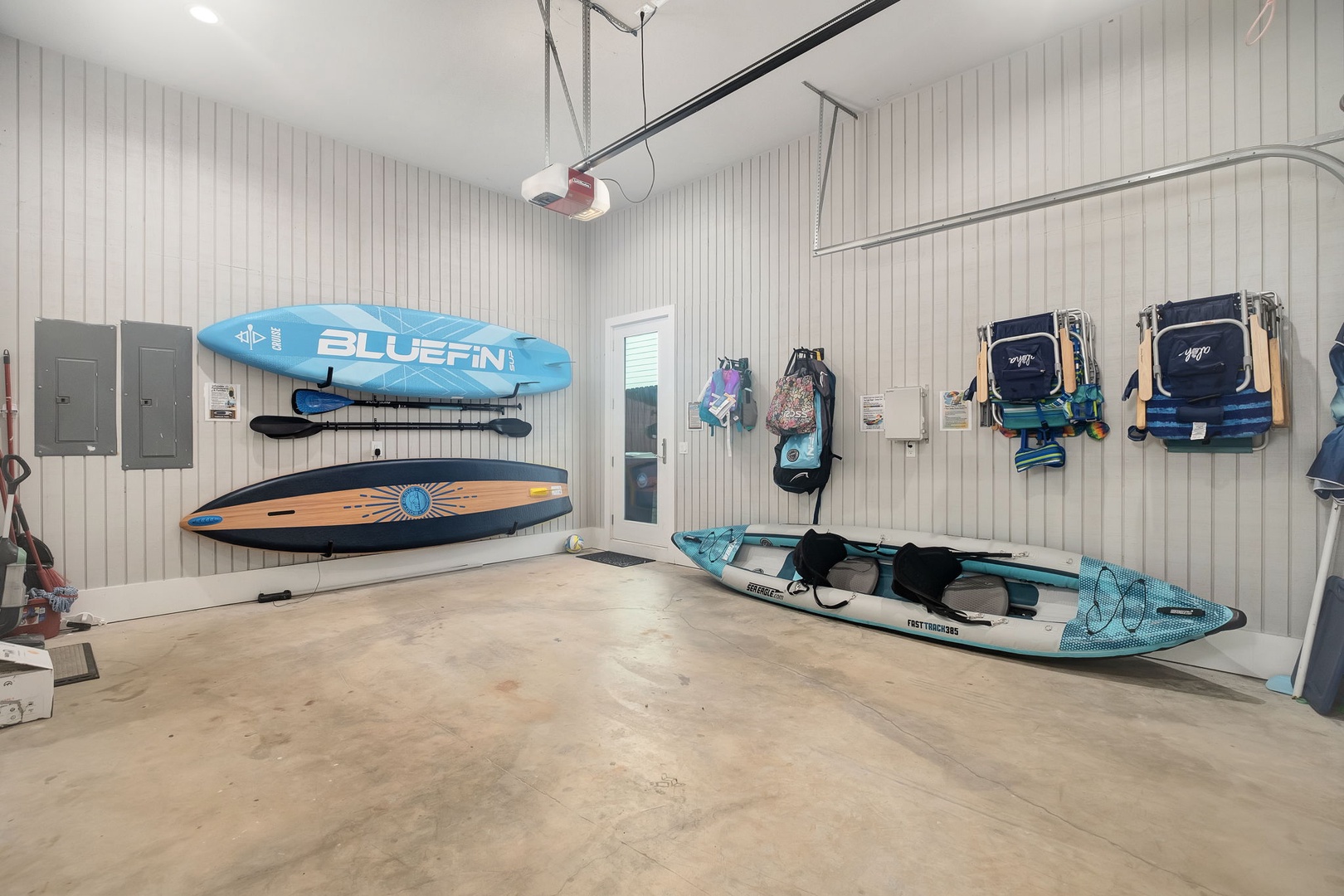 Your adventure starts here! Store paddleboards, kayaks, and beach gear in this spacious garage, then head straight to waterfront fun.