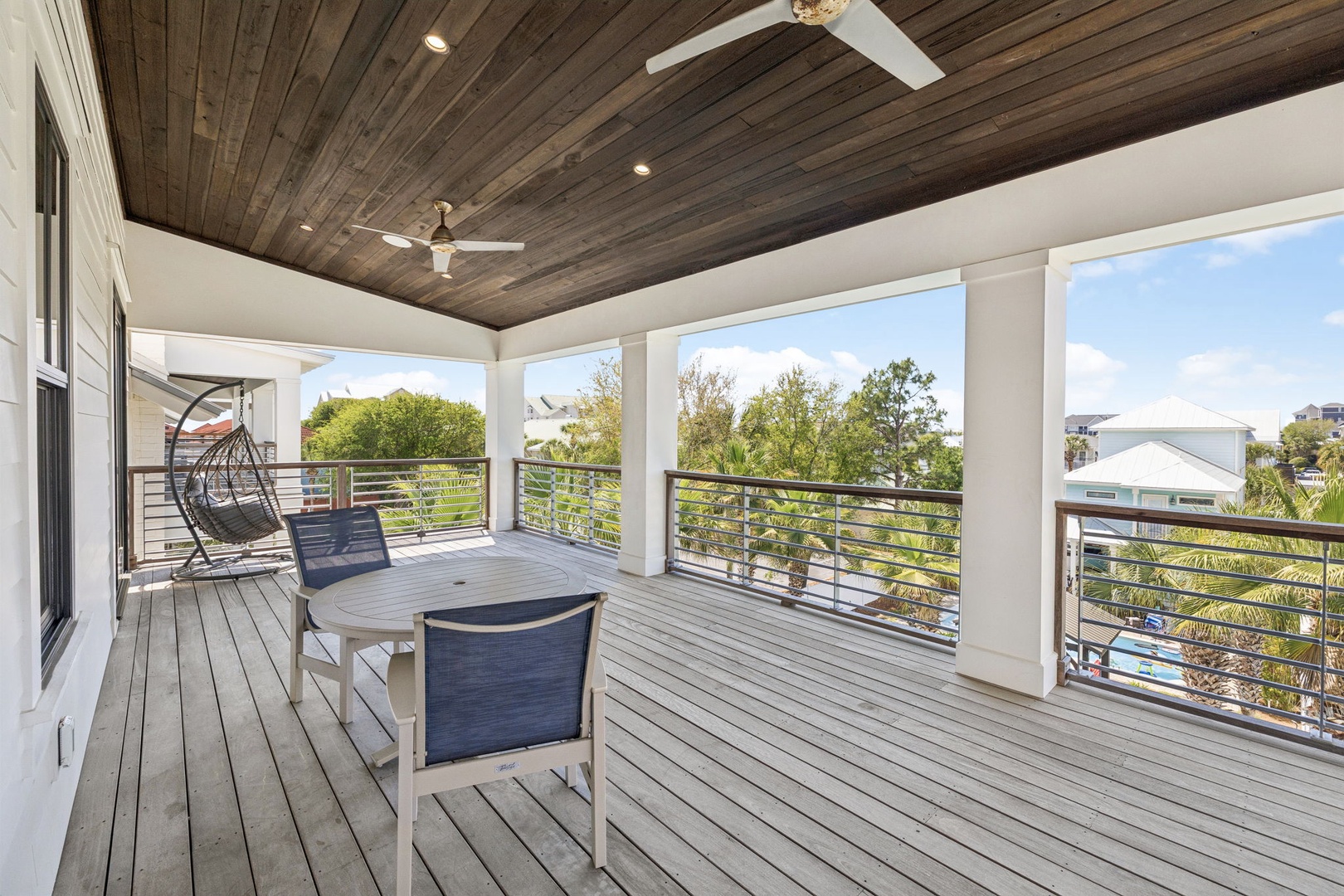 Unwind on your private covered deck with stunning tree-lined views, perfect for morning coffee or evening relaxation.