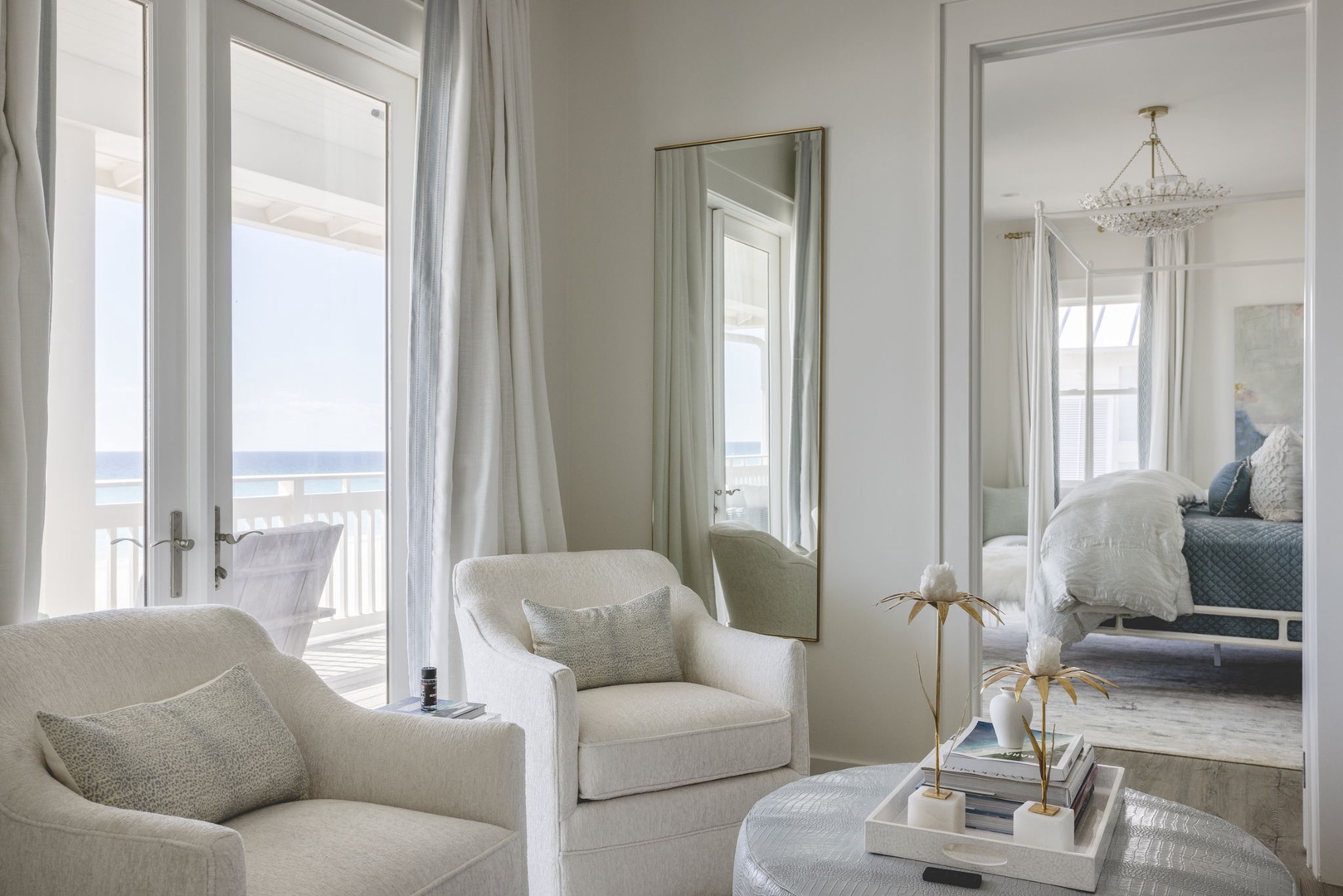 Sink into plush seating where soft light and serene sea views melt away your everyday stress. This tranquil retreat invites you to unwind in effortless coastal elegance.
